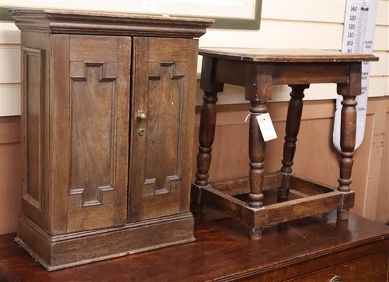 An oak cupboard and a joynt stool W.45cm and 48cm